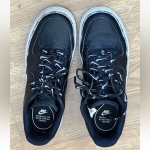 Nike women’s Black and White Air Force Sneakers